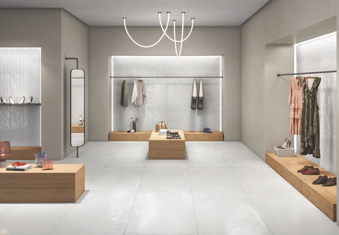 Light concrete-look retail floor — 600 × 1200 mm — Imperial Design Concepts, Mohali