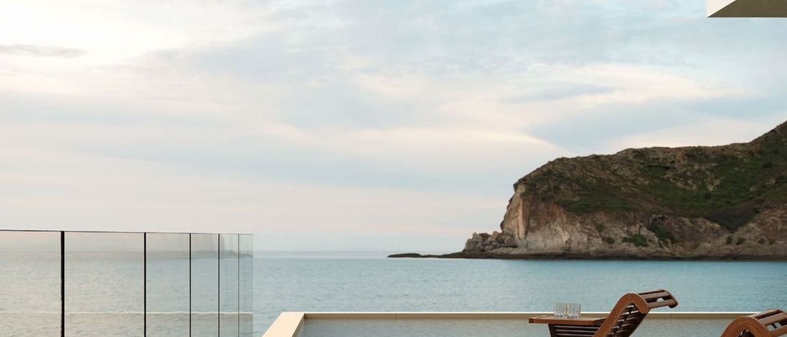 Poolside terrace paved in textured outdoor porcelain